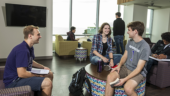 Students in a lounge space