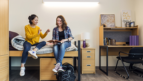 Students hanging out in dorm room