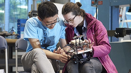 two students working