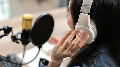 woman speaking on radio station