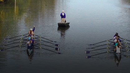 Students rowing at crew practice.