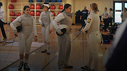 Students fencing.