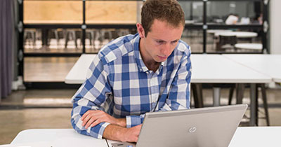 Student at a laptop.