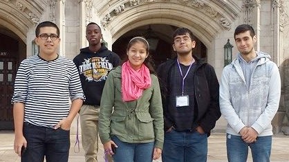 students standing in front of Deering Library