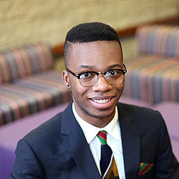 Man smiling in suit